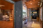 Rustic wood and concrete features throughout